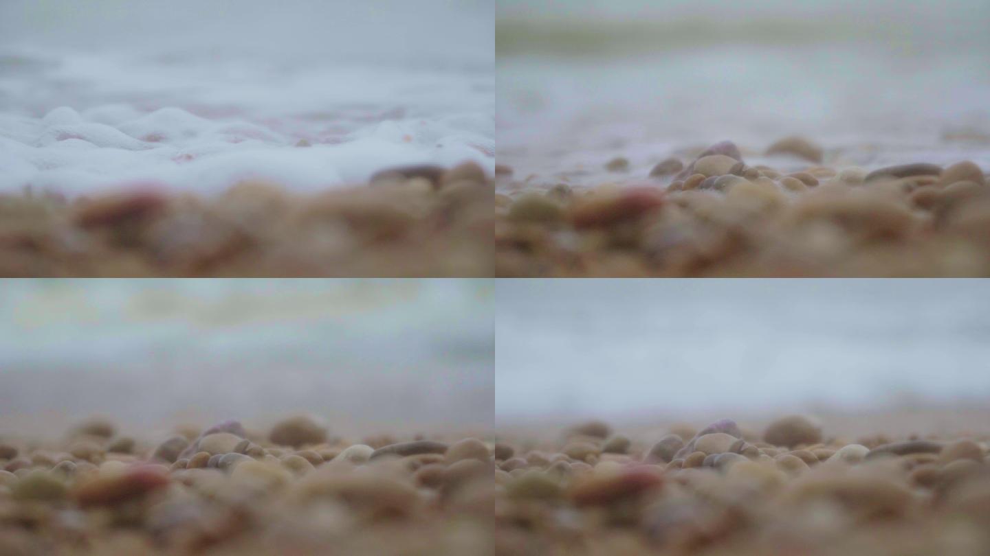 鹅卵石沙滩海浪冲刷拍打