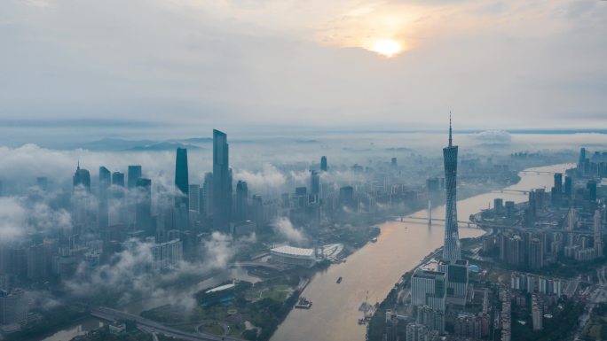 航拍日出云雾飘渺的广州珠江新城与广州塔