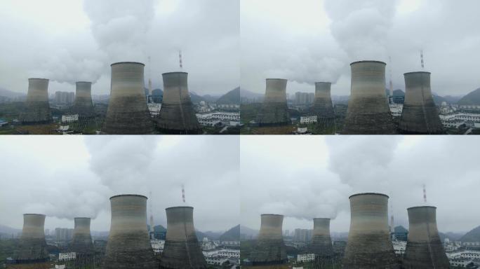 大烟囱冒出浓浓白烟火力发电厂大气污染环境