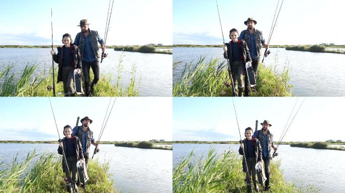 开心的微笑爸爸和儿子一起去钓鱼