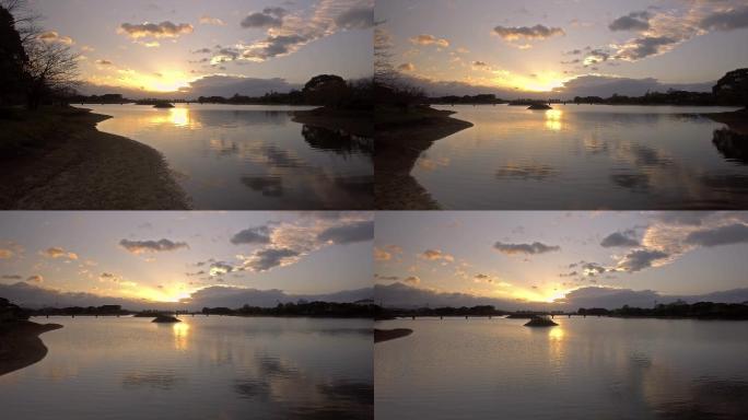 湖面上美丽的日落水面落日静谧