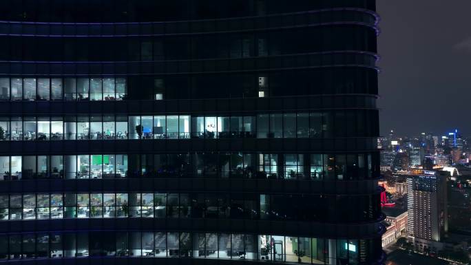 航拍上海商务楼白领加班忙碌夜景