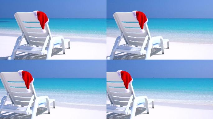 海滩上戴着圣诞老人帽的沙滩椅