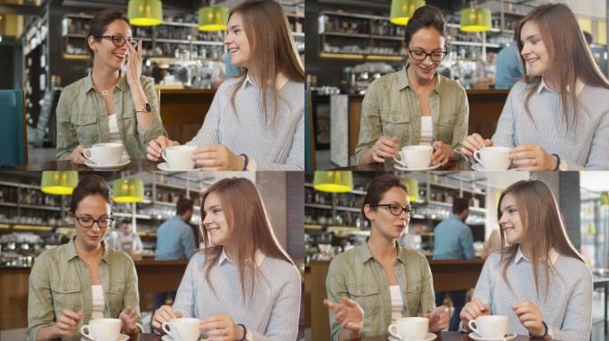 两个年轻女人在咖啡馆聊天