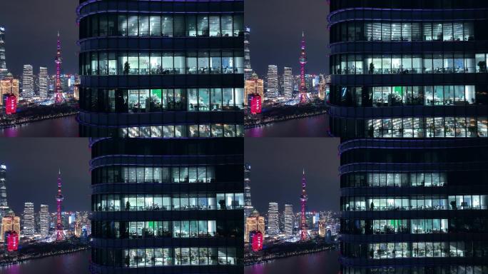 航拍上海商务楼白领加班忙碌夜景