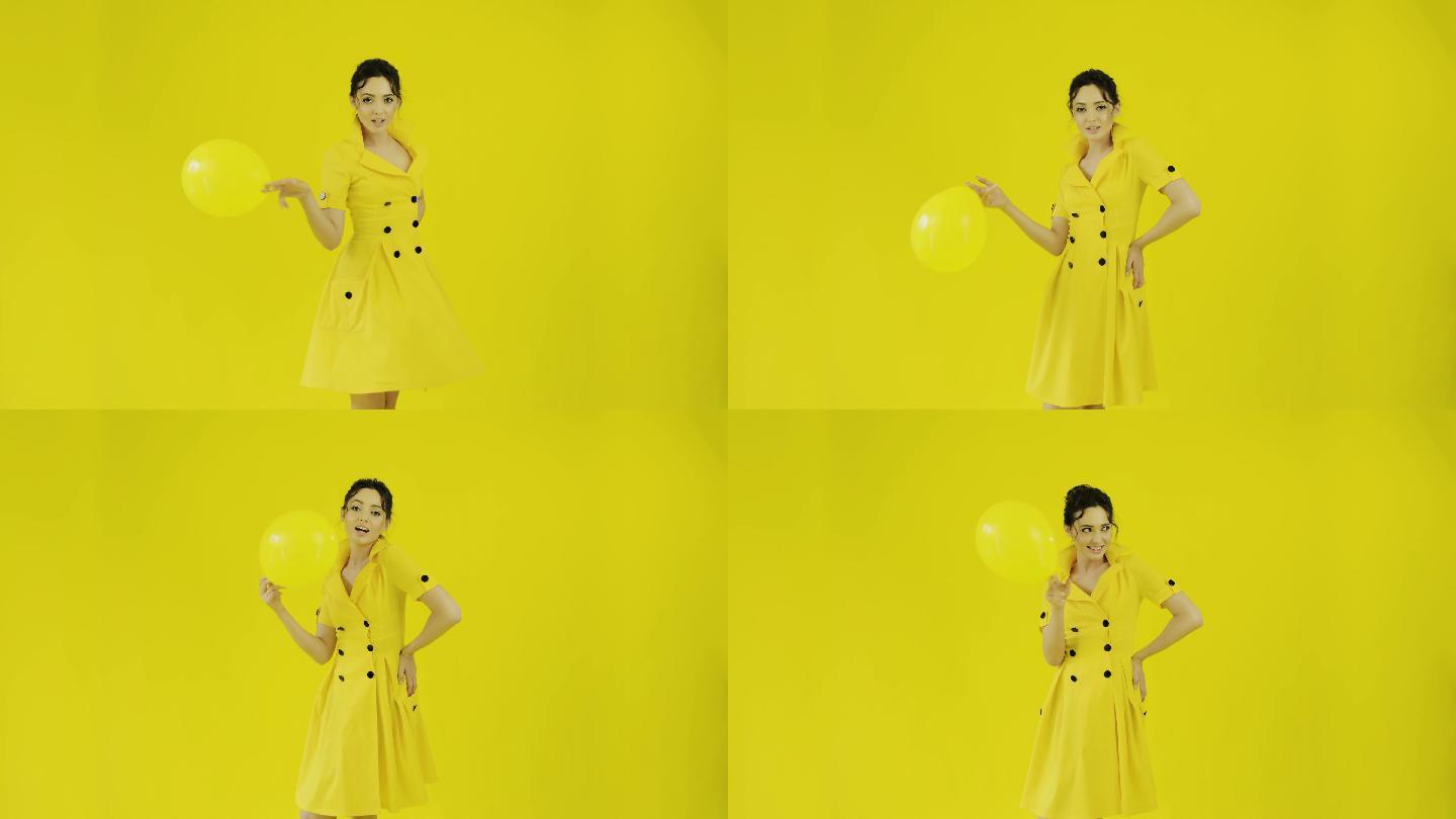 穿着黄色连衣裙的快乐女孩。