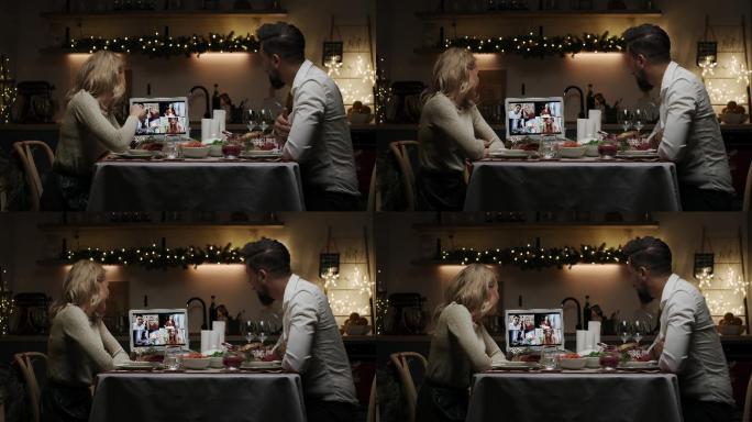 这对情侣在视频通话中吃圣诞晚餐