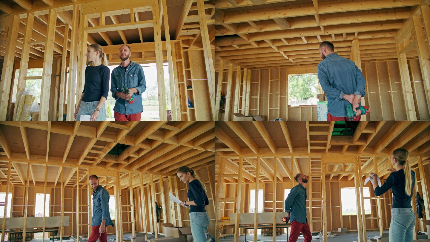 两个年轻人在讨论房子的建造