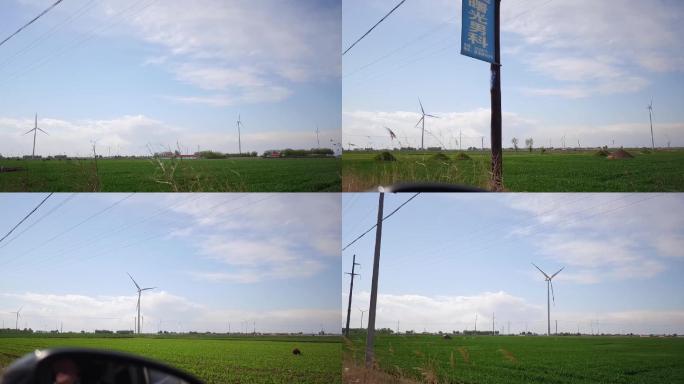 农田远处的发电风车