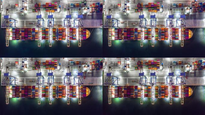 集装箱船夜间在港口装货，俯视集装箱船。