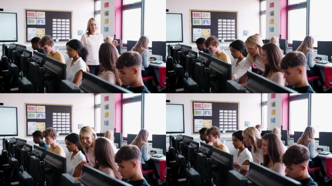 女教师帮助高中女生在计算机课上学习