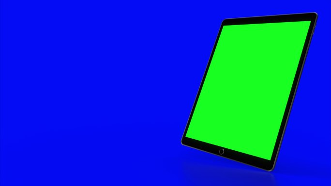 在蓝色背景上的绿色屏幕电脑