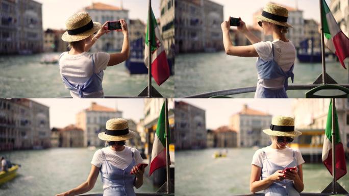 女性旅行者在威尼斯城的船上拍照