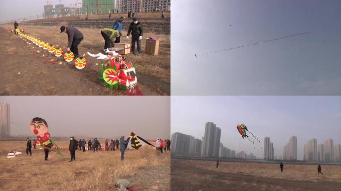 市民在河边空地放风筝娱乐锻炼身体