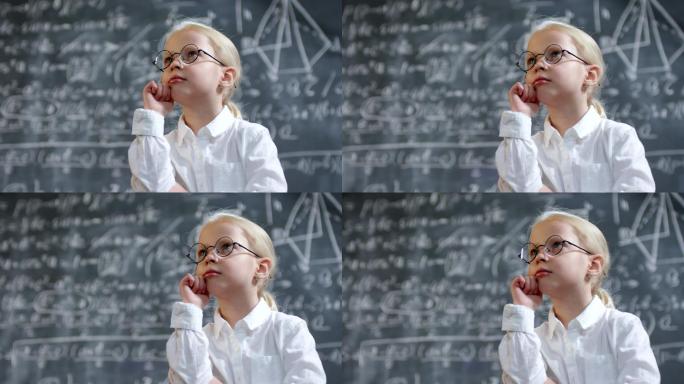 可爱的小女孩在思考数学问题