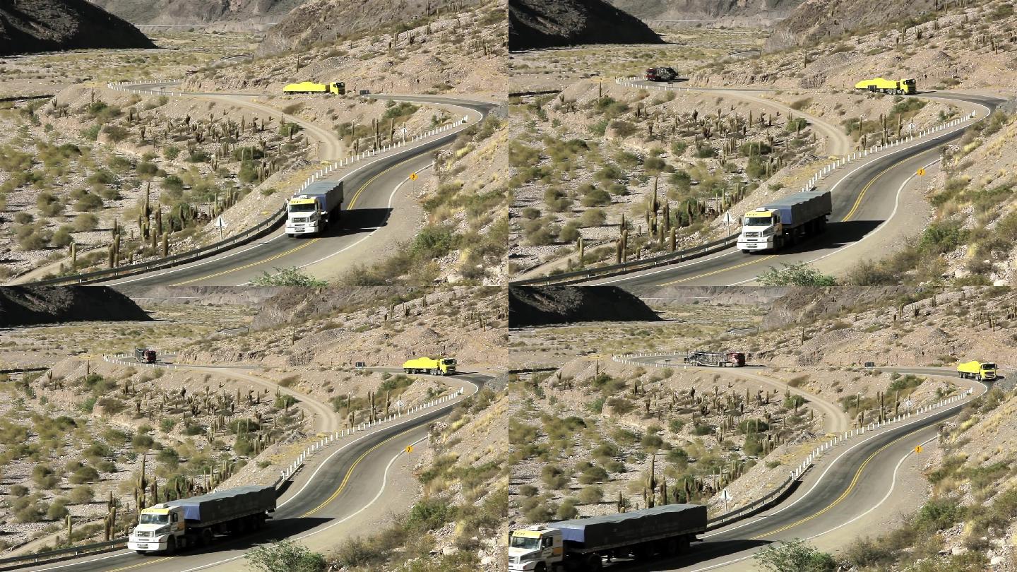 卡车在高原上的沙漠之路行驶。