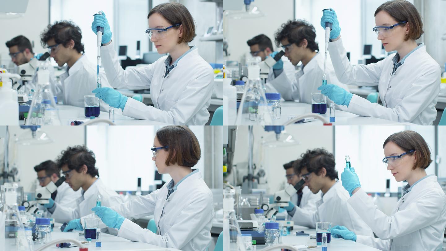 一群学生在化学教室的实验室工作。