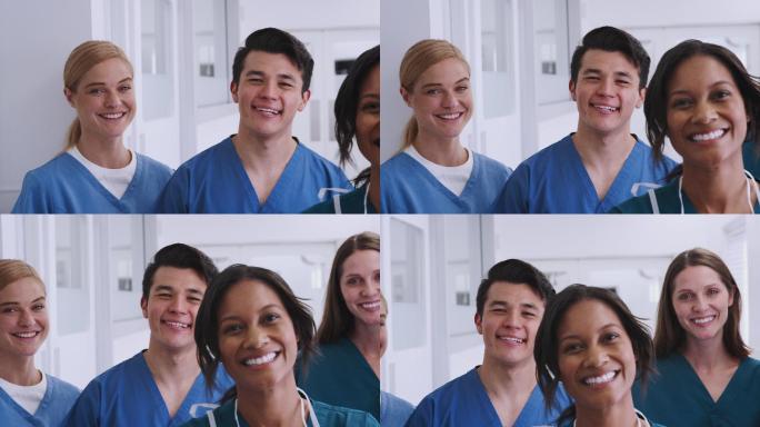 微笑的医疗队站在医院走廊上