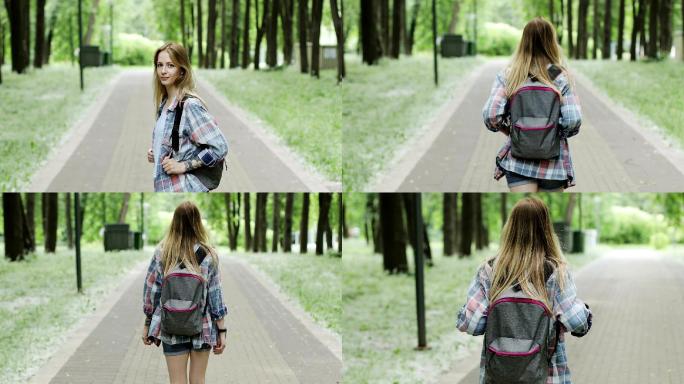 夏天背着背包去公园的年轻女子。