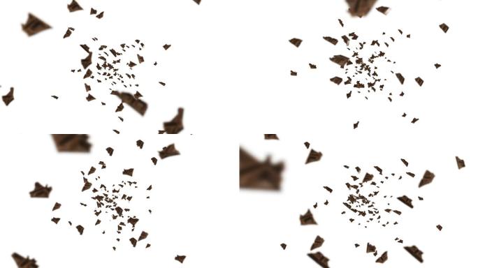 在黑色背景上飞行许多巧克力碎片