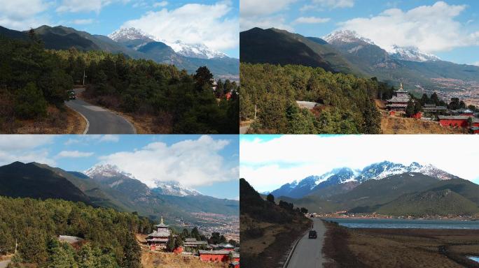 雪山公路行驶中的车辆