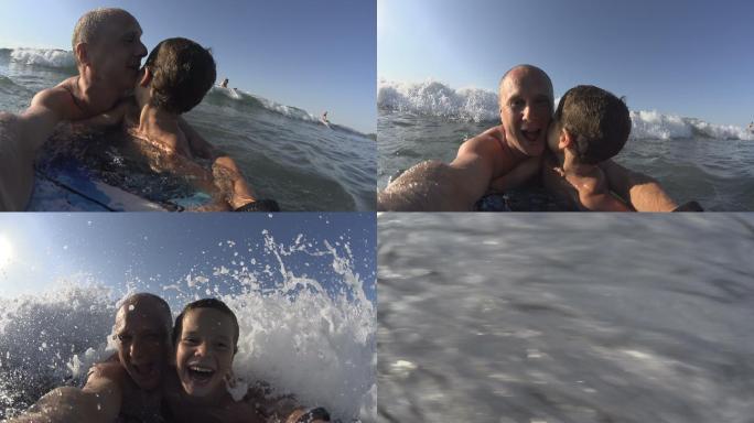 在海里玩耍的父子父亲带孩子游泳冲浪国外父