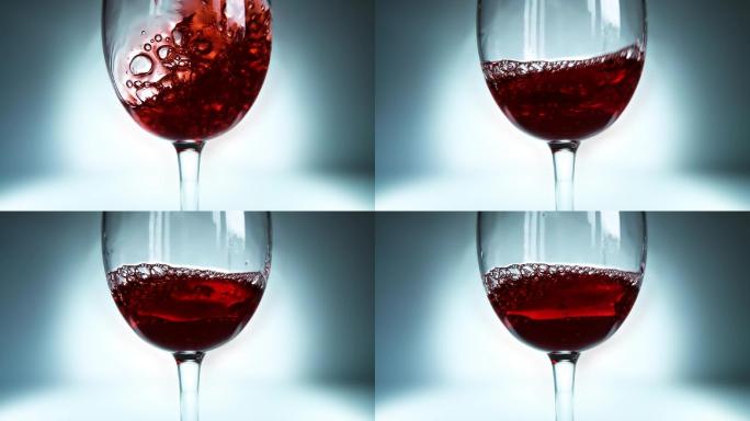 红酒倒入玻璃杯。进口酒水法国酒业喝酒品酒