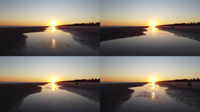 潮汐池上的日落大海海面夕阳晚霞唯美波光粼