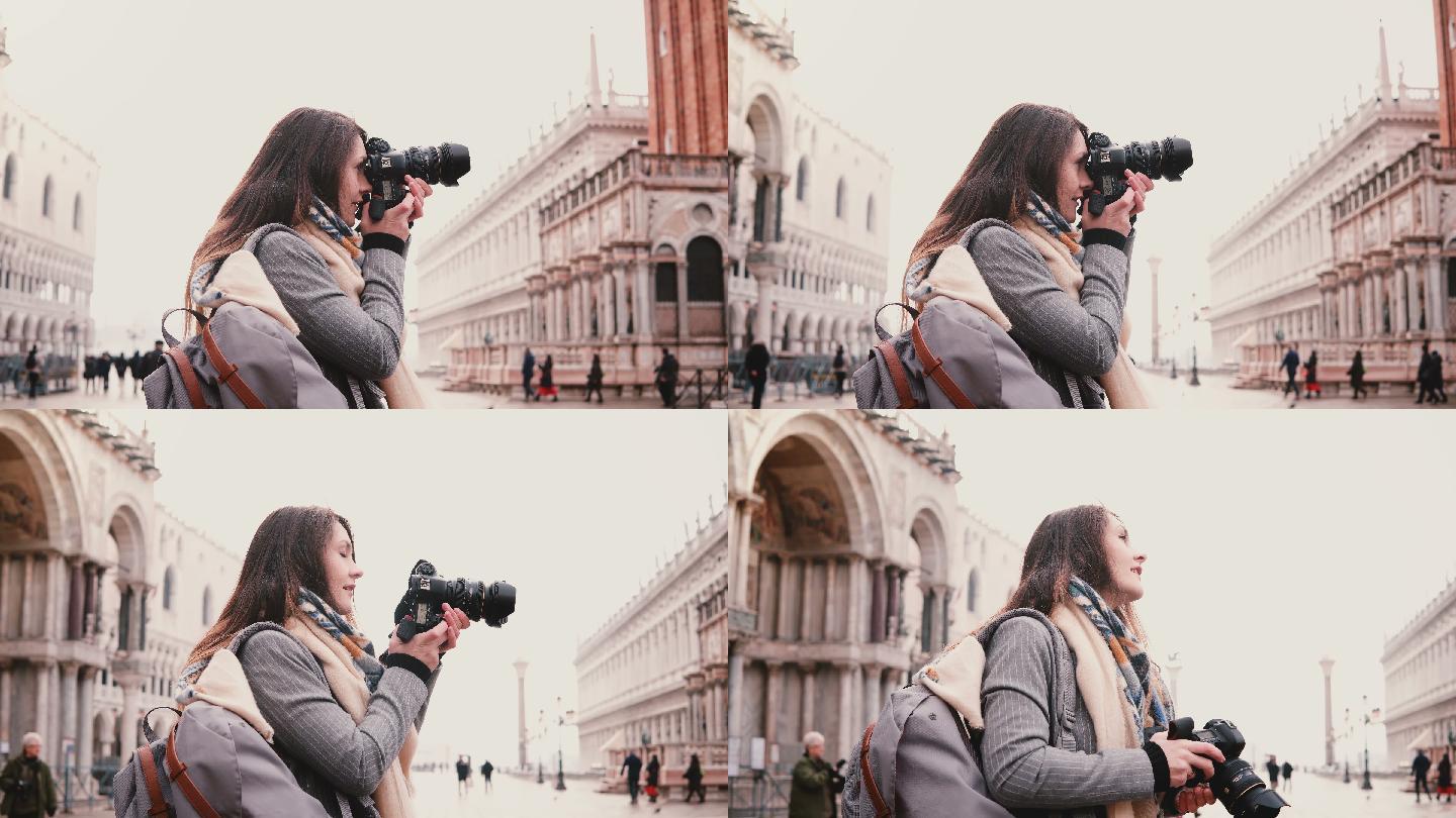 女人带着相机拍摄威尼斯圣马可广场