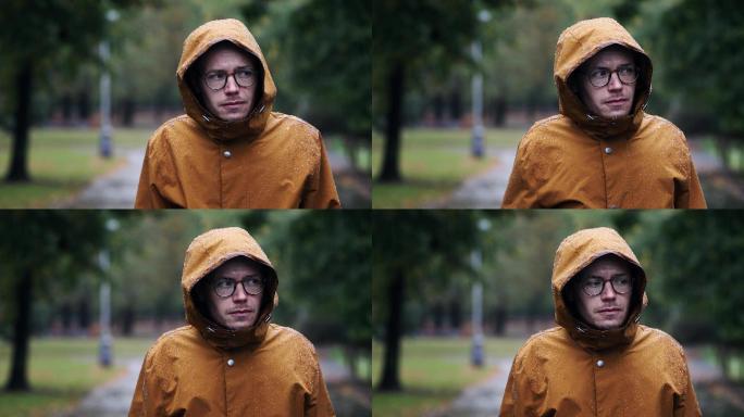 穿着雨衣的男子国外外国男人雨中下雨街道街