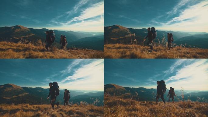 夫妇向山上走去爬山登山攀登勇往直前励志视
