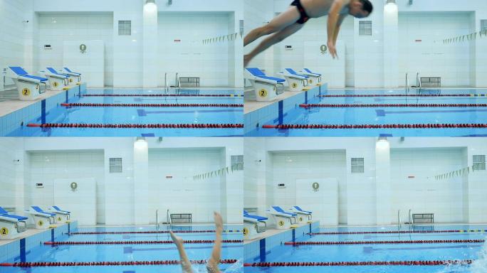 男子跳进游泳池室内泳池健身游泳锻炼身体
