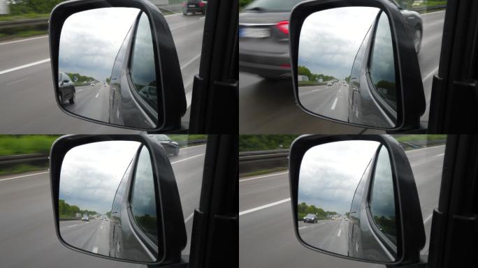 通过后视镜观看德国高速公路上的交通