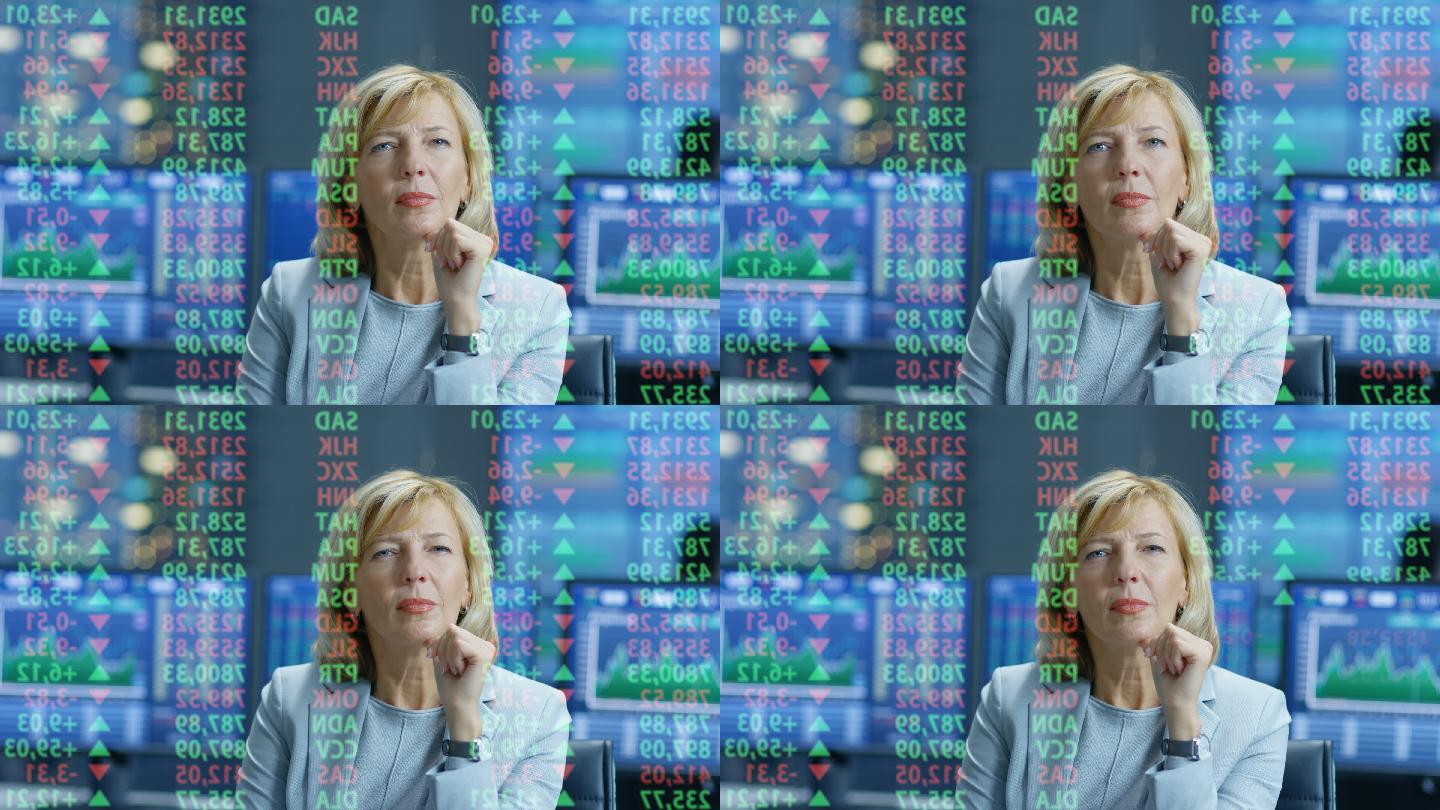 股票市场的女性高级管理人员查看股票号码