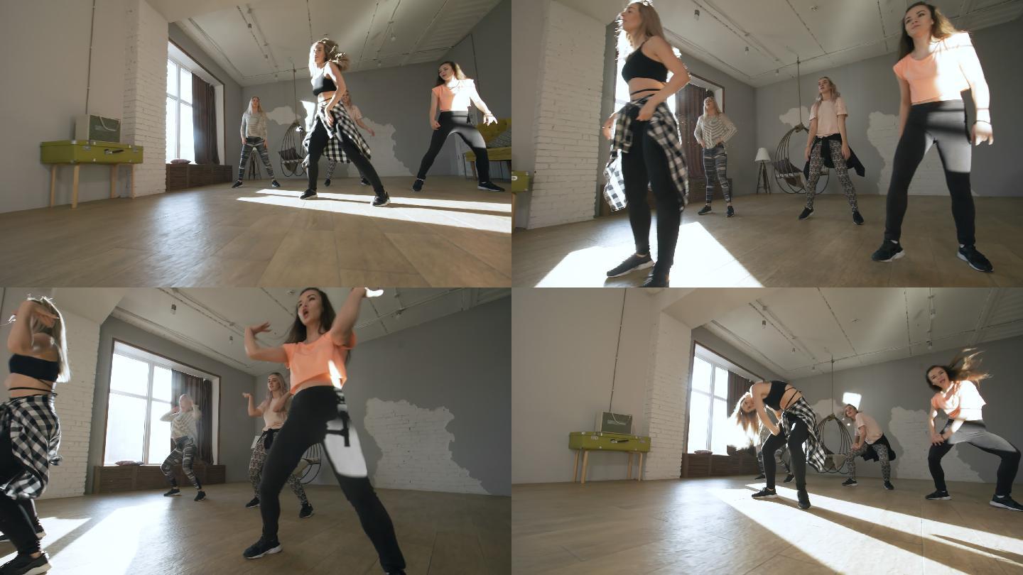 女舞者在排练舞蹈工作室编排舞蹈年轻活力