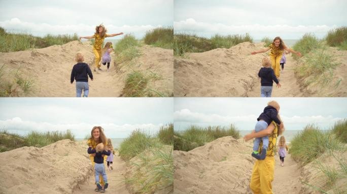 母亲带着女儿和小儿子跑向大海