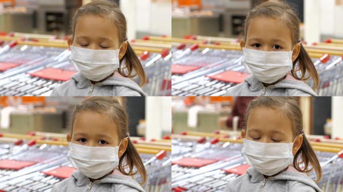 在超市里戴着医用口罩的小女孩