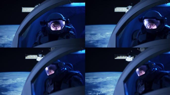 宇航员从太空船窗口向外看