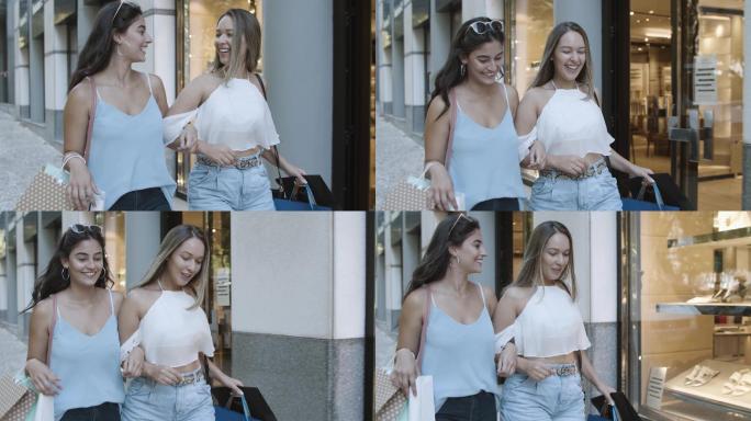 两个快乐的女人一起购物和散步