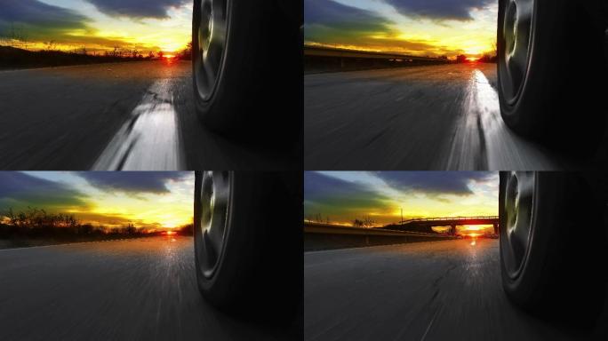 日落、日出时在乡村公路上开车