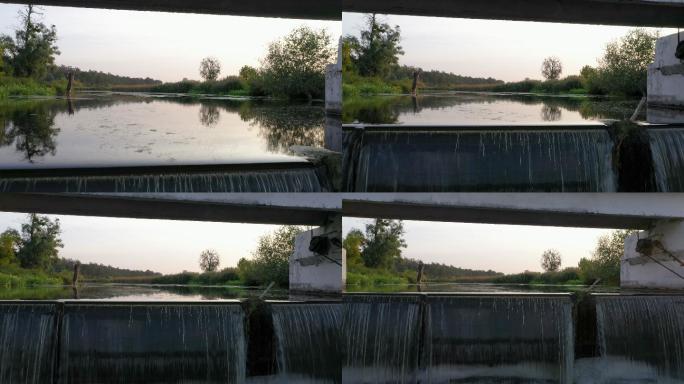 河上的小水坝灌溉轮水溢流