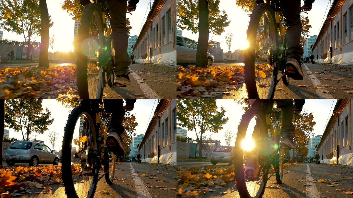 日落时骑自行车的特写镜头