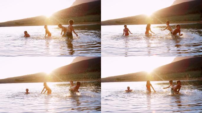 一群孩子在湖中嬉戏玩耍