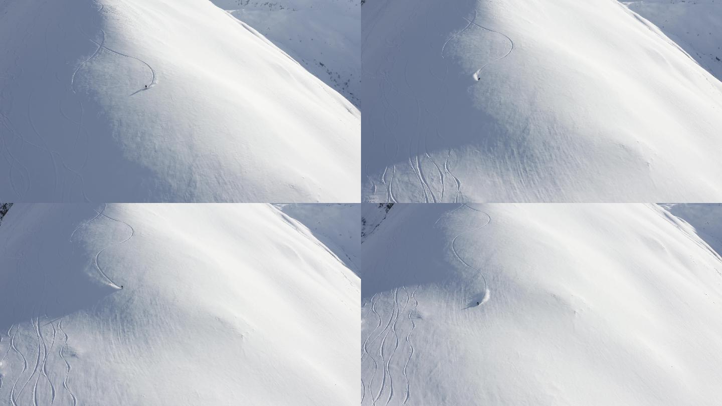 一名滑雪运动员从山上下来