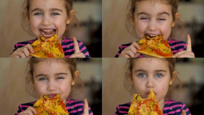 可爱的小女孩在吃披萨