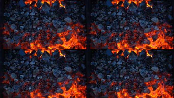 在火盆烤架中燃烧煤炭。