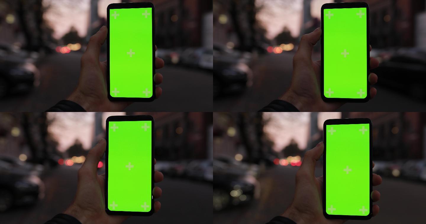 手持绿色屏幕模拟智能手机