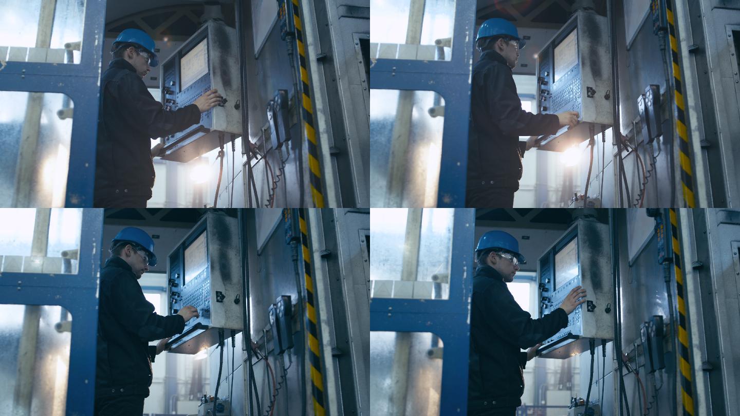 工人正在工厂使用控制面板计算机