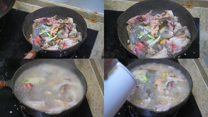 一位厨师在煮鱼头汤，煎鱼头并加水熬汤