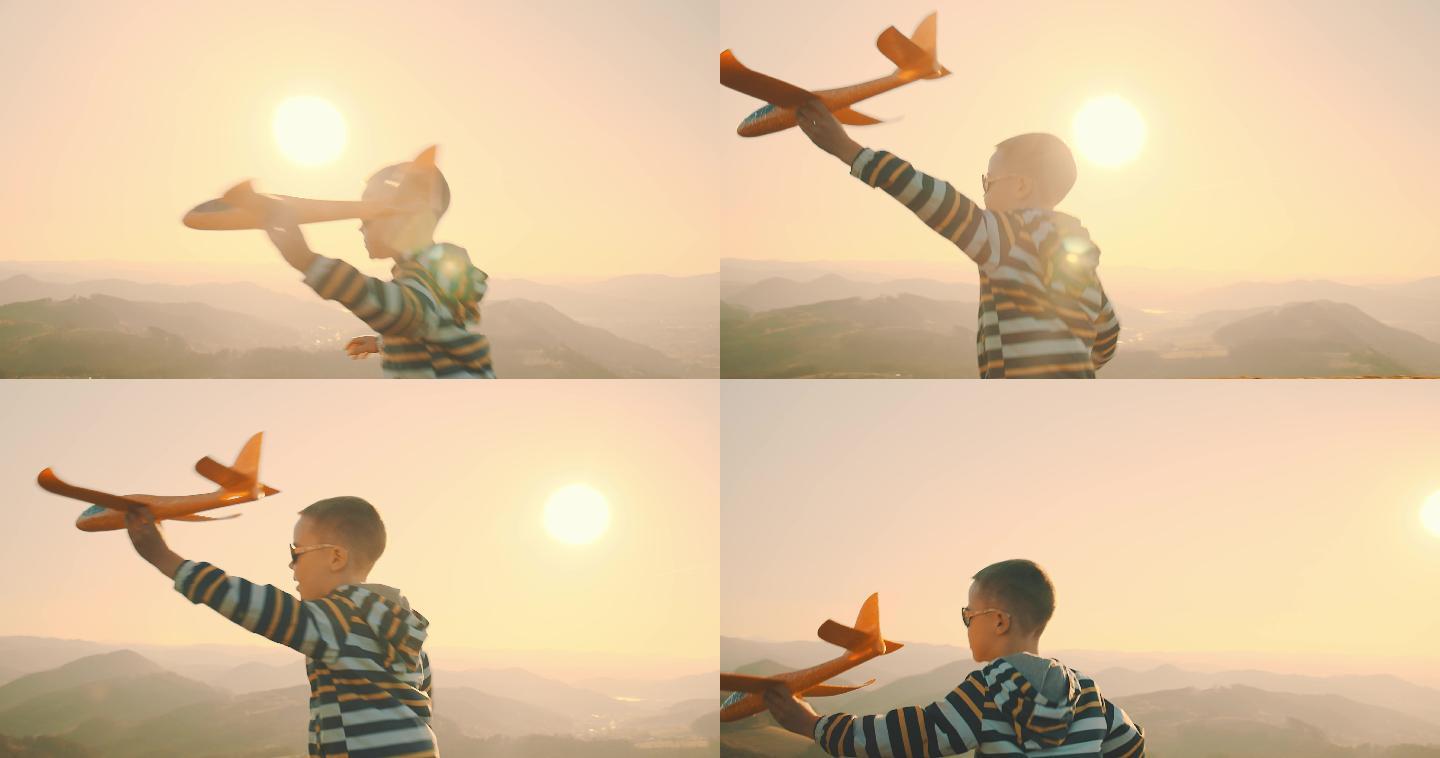 快乐的孩子在玩飞机玩具